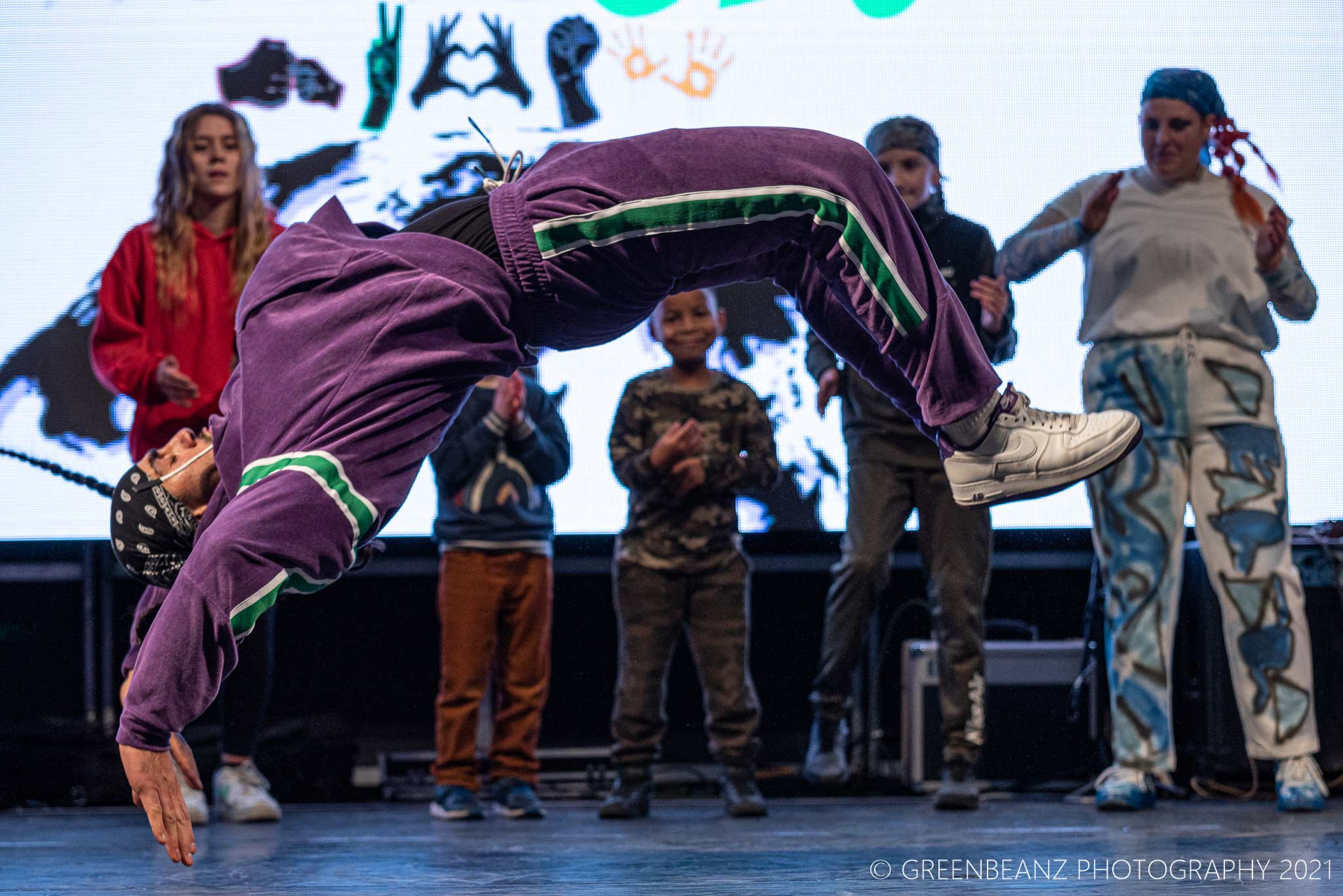 Toby Gorniak Breakdancer in air at Roots festival in Plymouth 2021