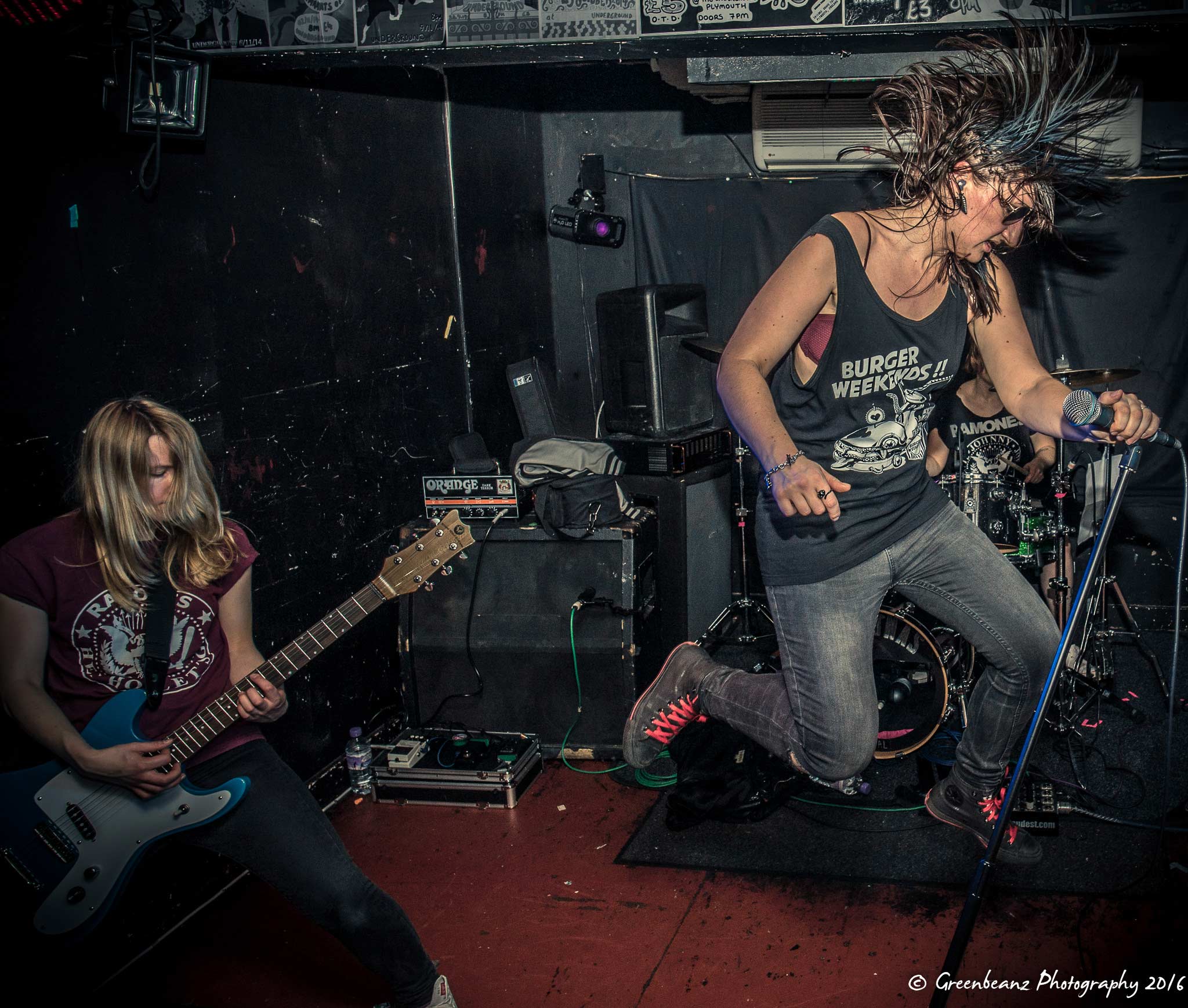 The Ramonas jumping on stage at Underground Plymouth