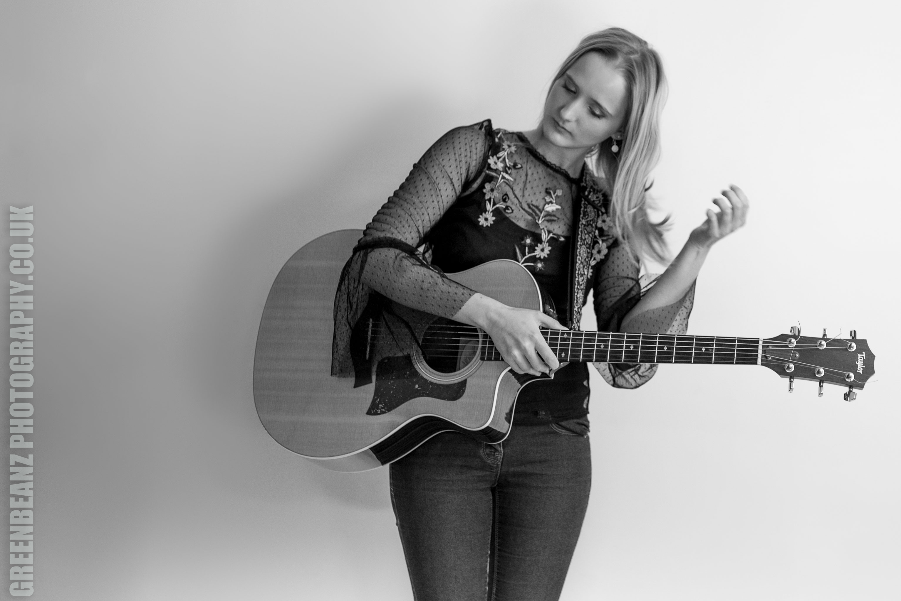 A monochrome relaxed candid of Kate Ferguson during her promotional music shoot