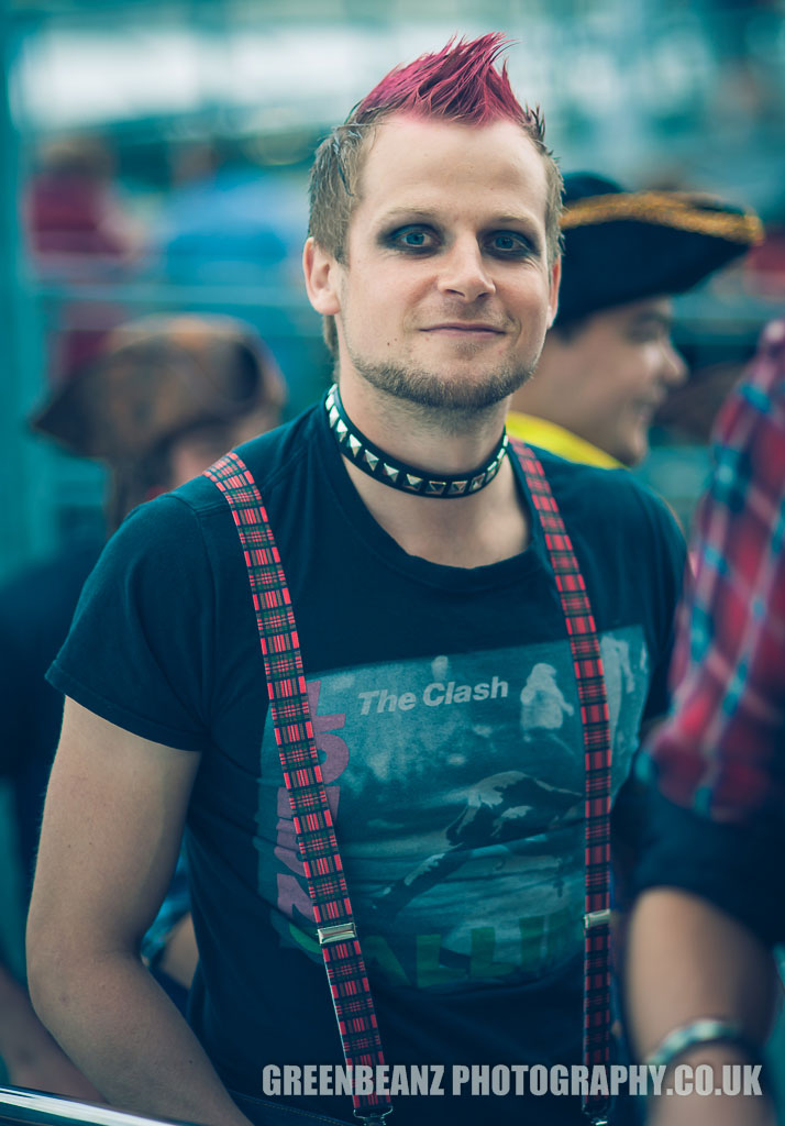 Punk Rock fan in Clash t-shirt tartan braces