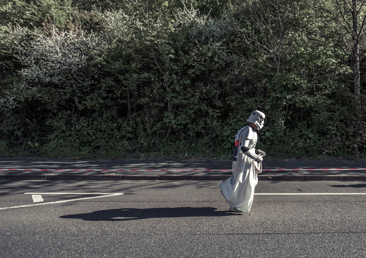 runner in a stormtrooper and white wedding dress
