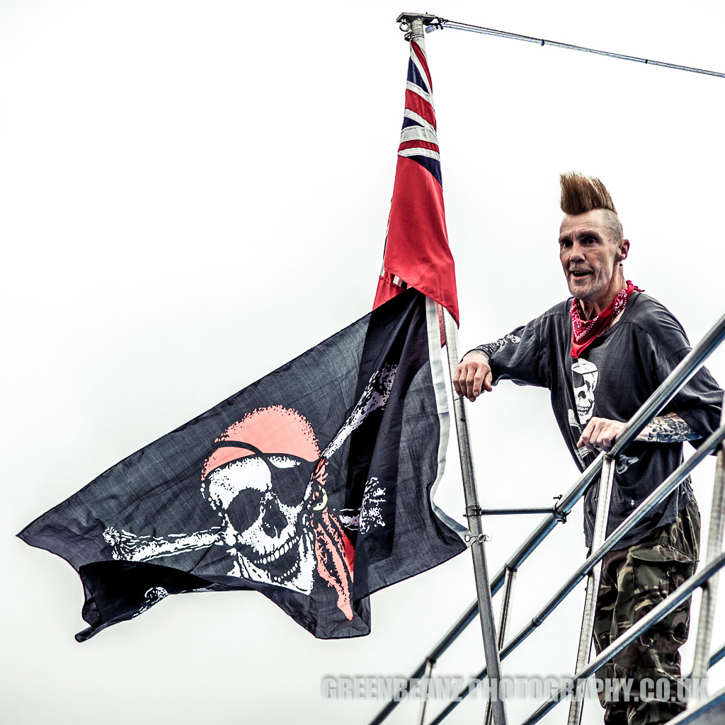 Sean Mudman Plymouth Rockabilly Drummer hoists Jolly Roger flag