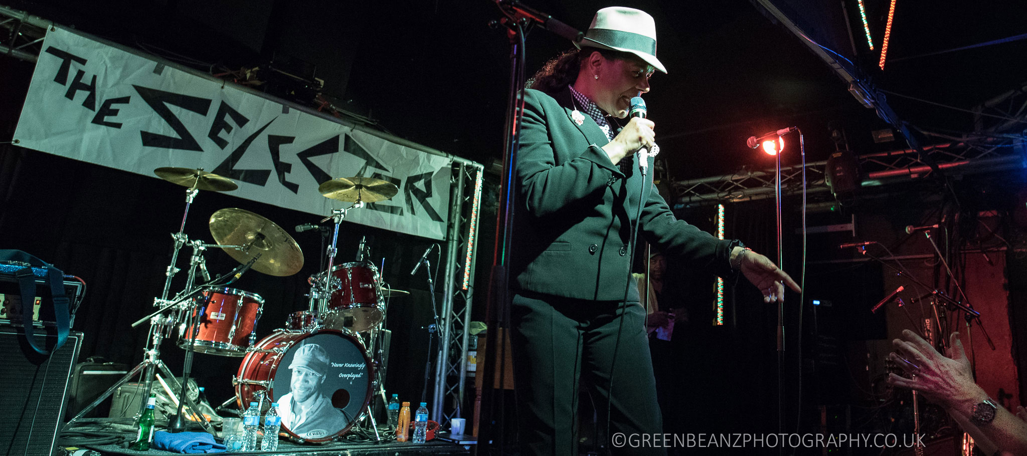 Audience member reaching out to Ska Singer Pauline Black from The Selecter 