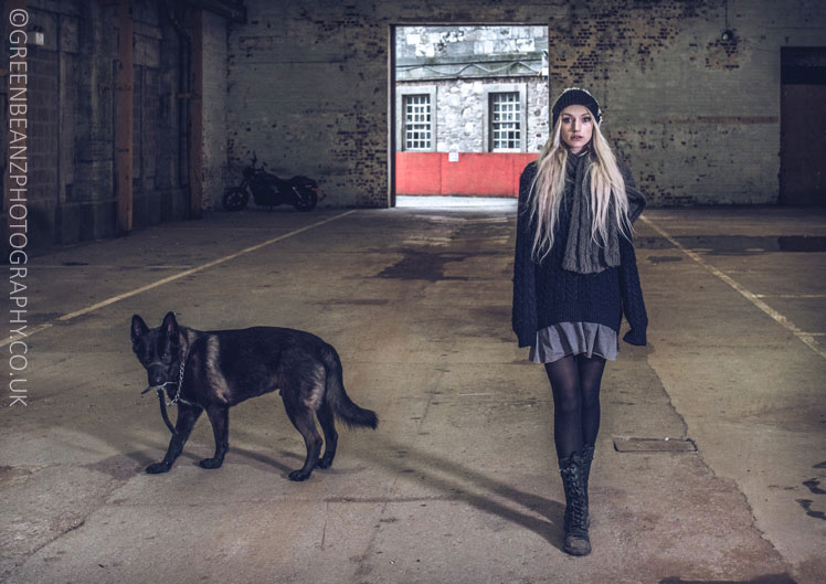 Model Olivia Harriett with black dog