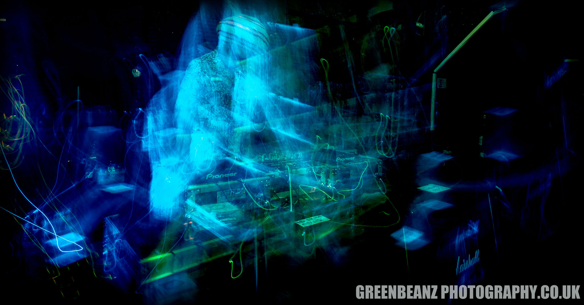 Long Exposure in camera photograph of Dub DJ Don Letts playing live in the UK