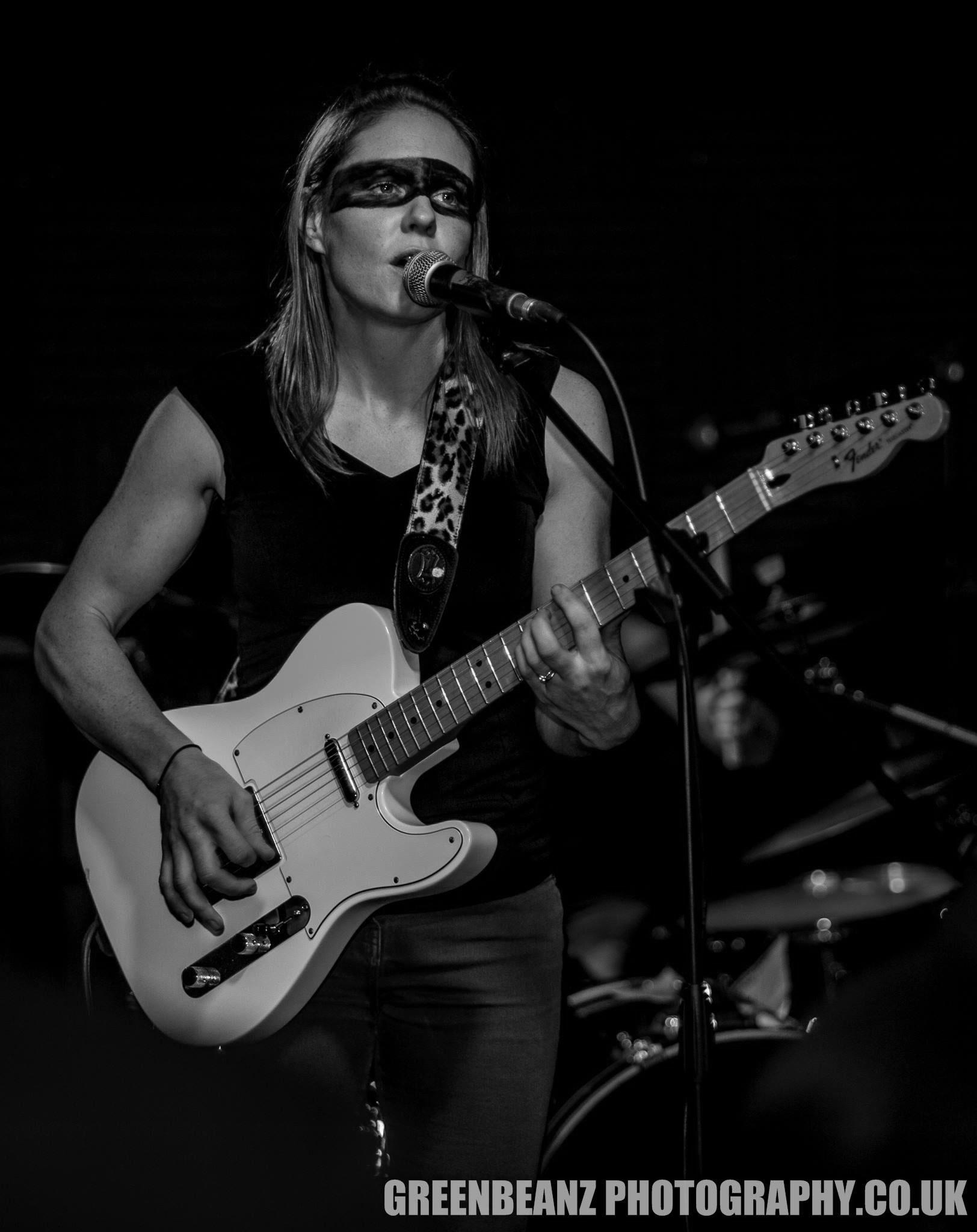 Sharon Kellaway weilds her telecaster live. She has the chops that help define The Eyelids sound.
